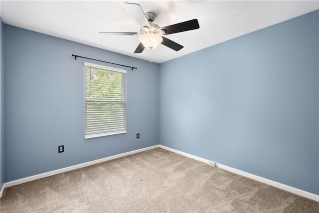 239 Mountain Dr, Carnegie, PA 15106 - carpeted spare room with baseboards and a ceiling fan