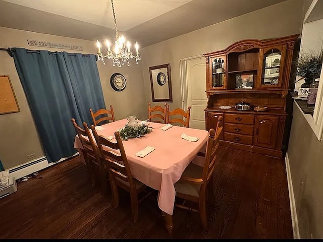 dining area with dark wood-style flooring, a chandelier, and baseboard heating