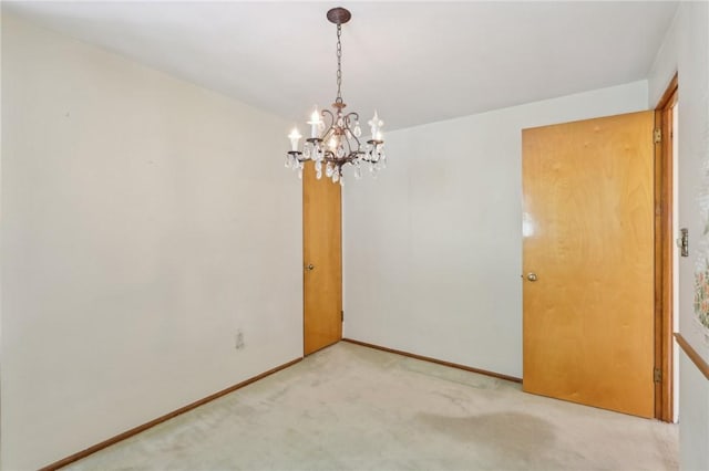 4782 Barone Dr, Whitehall, PA 15227 - spare room with a chandelier, light carpet, and baseboards