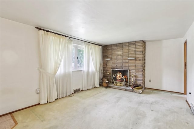 4782 Barone Dr, Whitehall, PA 15227 - unfurnished living room featuring carpet floors and a fireplace