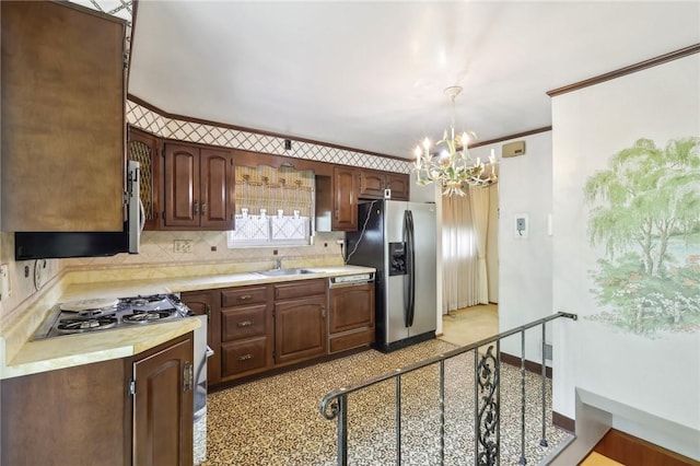 4782 Barone Dr, Whitehall, PA 15227 - kitchen with stainless steel fridge, a sink, light countertops, a chandelier, and crown molding
