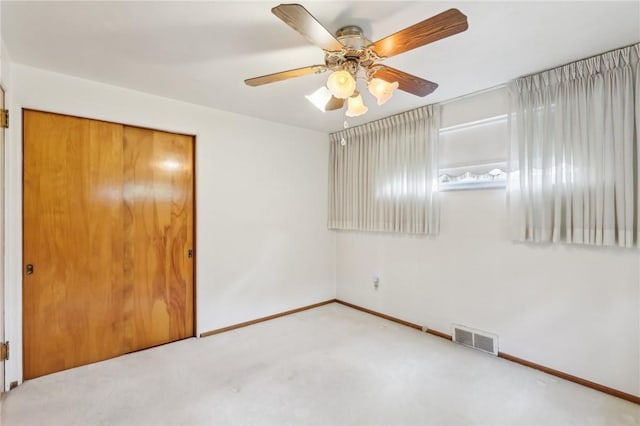 4782 Barone Dr, Whitehall, PA 15227 - unfurnished bedroom with carpet, baseboards, a closet, and a ceiling fan