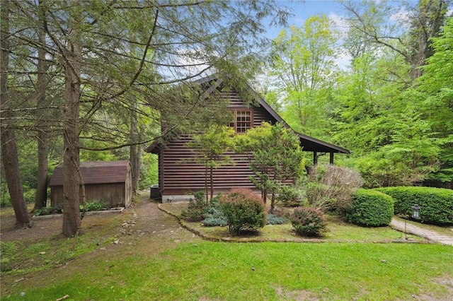 365 Hemlock Bnd, Emlenton, PA 16373 - view of property exterior with log exterior and a yard