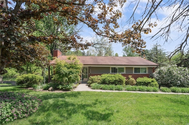 200 Dorseyville Rd, Ohara, PA 15215 - ranch-style house with a front lawn, a chimney, and brick siding
