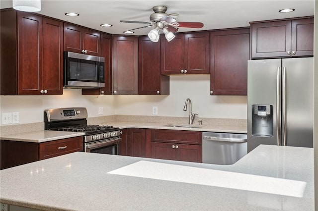 200 Dorseyville Rd, Ohara, PA 15215 - kitchen featuring stainless steel appliances, a sink, a ceiling fan, recessed lighting, and light countertops