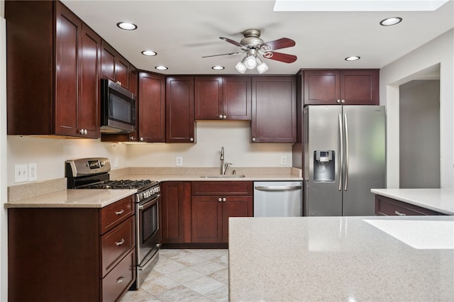 200 Dorseyville Rd, Ohara, PA 15215 - kitchen featuring appliances with stainless steel finishes, a sink, a ceiling fan, recessed lighting, and dark brown cabinets
