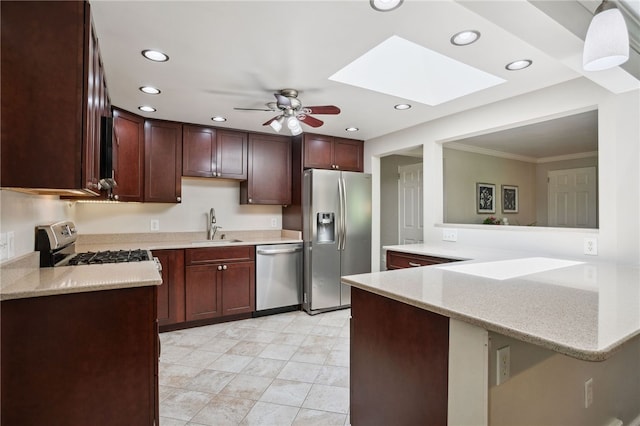 200 Dorseyville Rd, Ohara, PA 15215 - kitchen with stainless steel appliances, a skylight, a sink, crown molding, and a ceiling fan