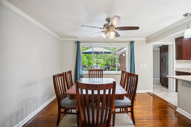 200 Dorseyville Rd, Ohara, PA 15215 - dining space featuring baseboards, ornamental molding, a ceiling fan, and light wood-type flooring