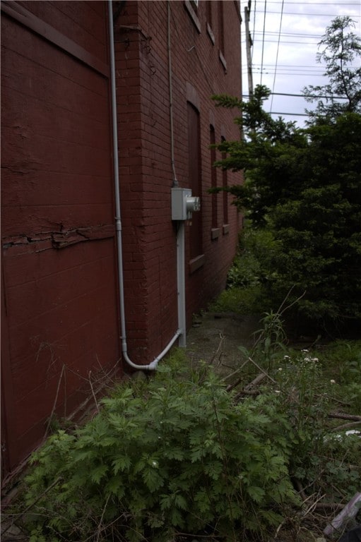518 Middle Ave, Wilmerding, PA 15148 - view of home's exterior featuring brick siding