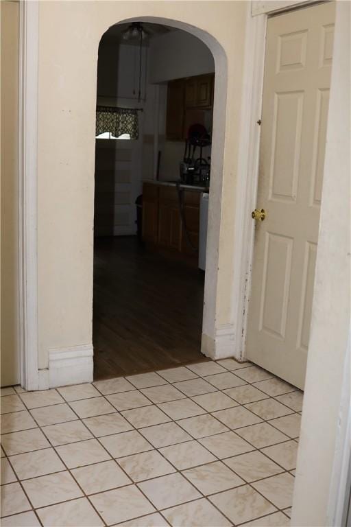 518 Middle Ave, Wilmerding, PA 15148 - hall with arched walkways, light tile patterned flooring, and baseboards