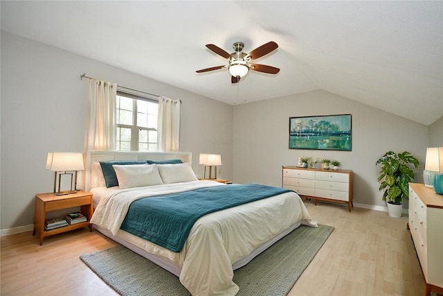 6755 Mars Crider Rd, Seven Fields Boro, PA 16046 - bedroom with light wood-style flooring, vaulted ceiling, ceiling fan, and baseboards