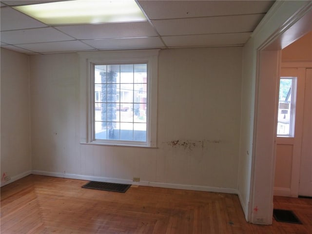 802 Howard St, Monongahela, PA 15063 - empty room featuring a paneled ceiling, plenty of natural light, and baseboards