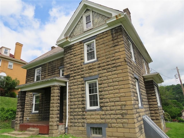 802 Howard St, Monongahela, PA 15063 - view of home's exterior with a chimney