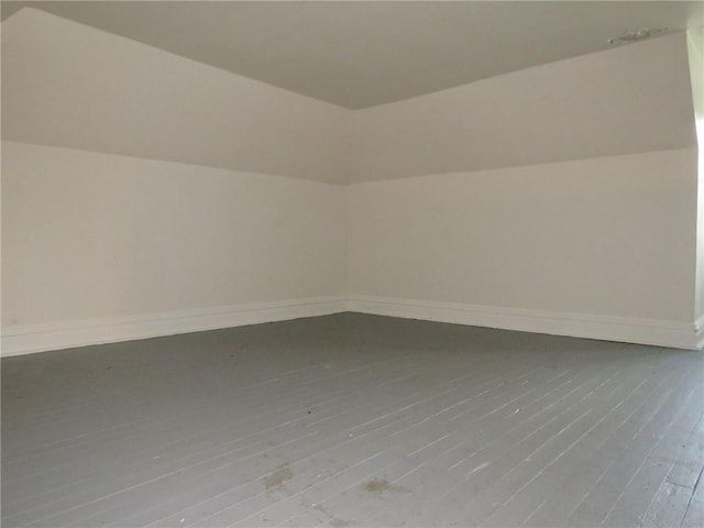 802 Howard St, Monongahela, PA 15063 - additional living space with hardwood / wood-style floors, baseboards, and vaulted ceiling