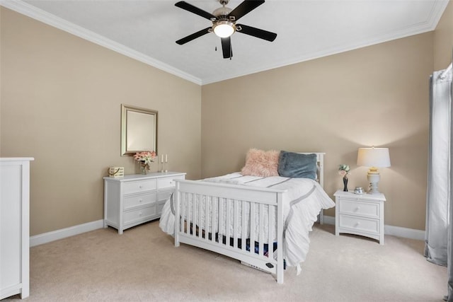 bedroom featuring crown molding, light carpet, baseboards, and a ceiling fan
