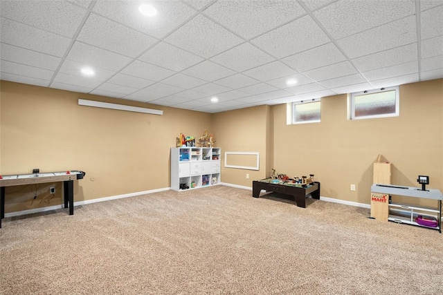 playroom with carpet, recessed lighting, baseboards, and a drop ceiling