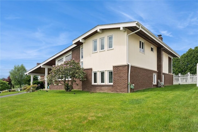 116 Tangelo Dr, Jefferson Hills, PA 15025 - view of side of property with brick siding and a chimney