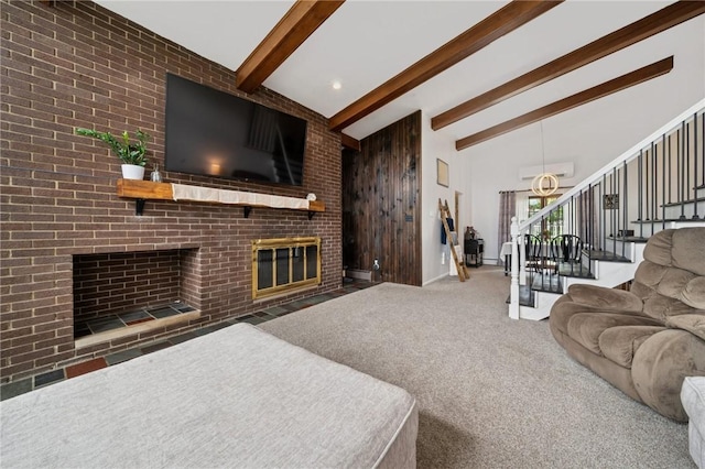116 Tangelo Dr, Jefferson Hills, PA 15025 - living area featuring a fireplace, stairs, a wall unit AC, baseboards, and carpet floors