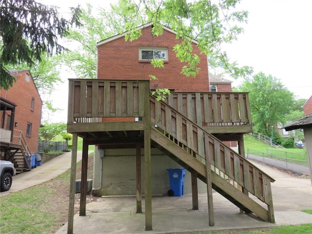 5270 Orchard Hill Dr, Whitehall, PA 15236 - back of house with brick siding and stairway