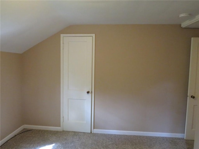 5270 Orchard Hill Dr, Whitehall, PA 15236 - additional living space with carpet floors, vaulted ceiling, and baseboards
