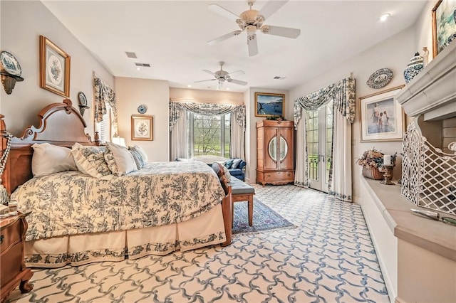 bedroom featuring access to exterior, multiple windows, baseboards, and ceiling fan