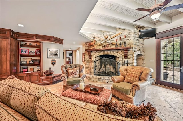 living area with a large fireplace, ceiling fan, beam ceiling, and recessed lighting