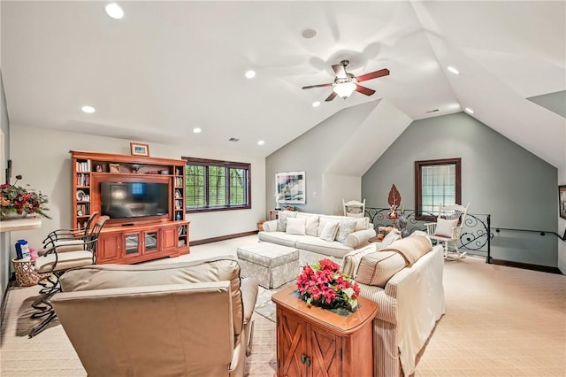 living area featuring recessed lighting, a ceiling fan, light colored carpet, vaulted ceiling, and baseboards