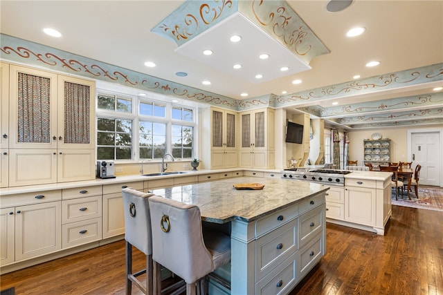 265 Scaife Rd, Sewickley Heights, PA 15143 - kitchen featuring a sink, a peninsula, a center island, dark wood-style floors, and gray cabinets