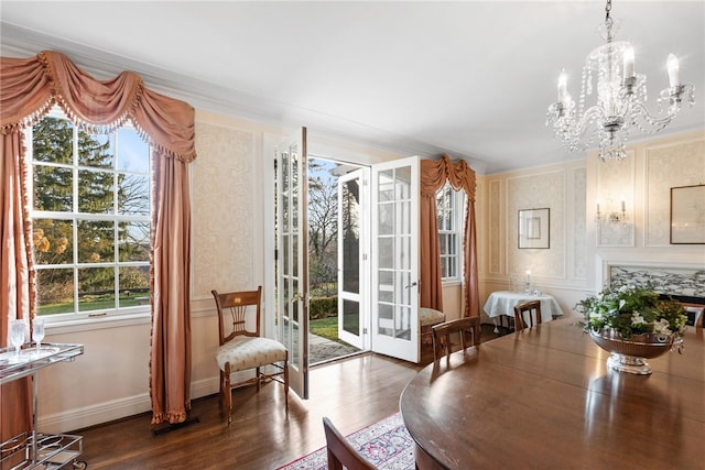 265 Scaife Rd, Sewickley Heights, PA 15143 - dining space featuring dark wood finished floors, french doors, a chandelier, and baseboards