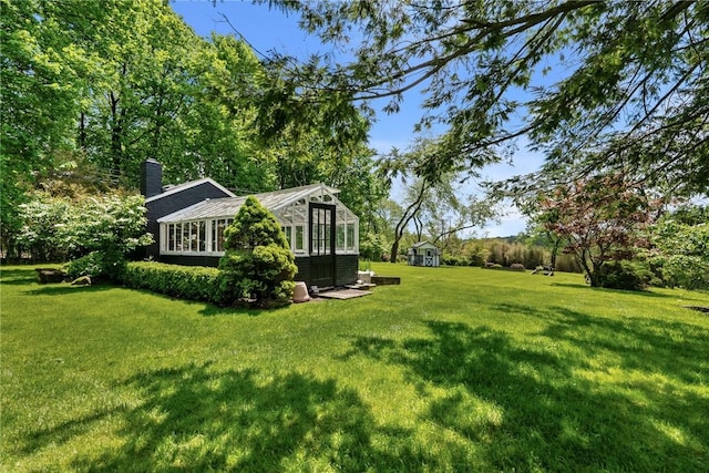 265 Scaife Rd, Sewickley Heights, PA 15143 - view of green lawn featuring a sunroom