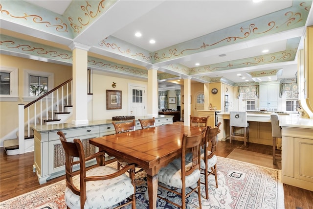 265 Scaife Rd, Sewickley Heights, PA 15143 - dining area featuring decorative columns, wood finished floors, recessed lighting, and stairs