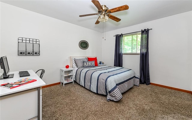 carpeted bedroom with baseboards and ceiling fan