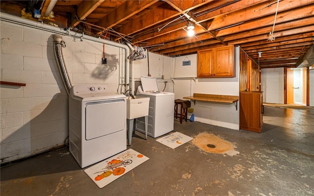 unfinished basement with washer and dryer
