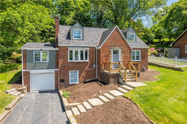 3334 Comanche Rd, Upper St Clair, PA 15241 - view of front of house featuring brick siding, asphalt driveway, an attached garage, and a chimney