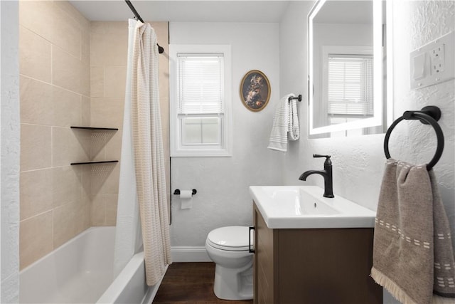 3334 Comanche Rd, Upper St Clair, PA 15241 - full bathroom featuring toilet, wood finished floors, vanity, baseboards, and shower / bathtub combination with curtain
