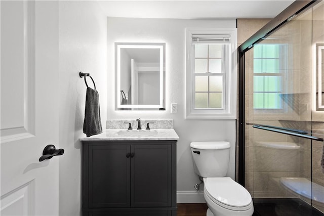 3334 Comanche Rd, Upper St Clair, PA 15241 - bathroom featuring toilet, a stall shower, vanity, and baseboards