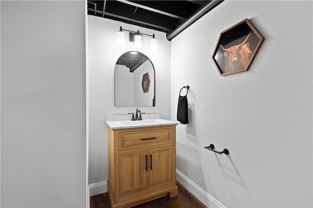 3334 Comanche Rd, Upper St Clair, PA 15241 - bathroom featuring baseboards, vanity, and wood finished floors