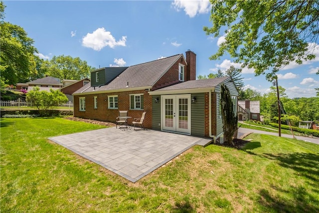 3334 Comanche Rd, Upper St Clair, PA 15241 - rear view of property featuring french doors, a patio area, brick siding, and a chimney