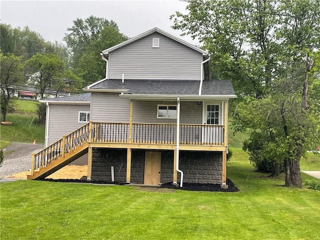 1215 Main St, Bentleyville, PA 15314 - back of property with a yard, a wooden deck, and stairway