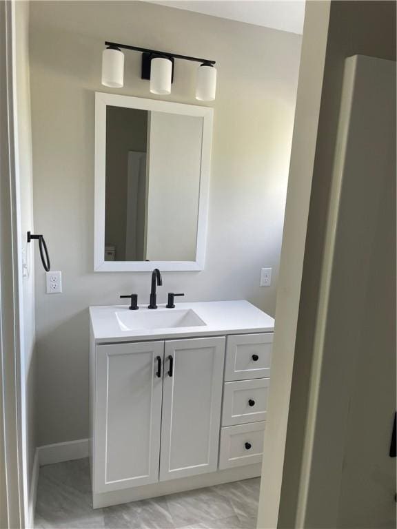 1215 Main St, Bentleyville, PA 15314 - bathroom featuring vanity and baseboards