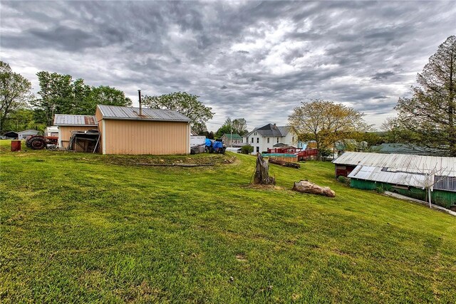 257 Lavansville Rd, Somerset Twp, PA 15501 - view of grassy yard with a pole building and an outdoor structure