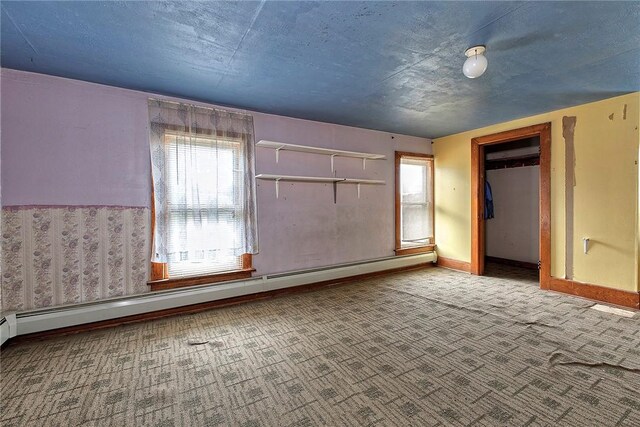 257 Lavansville Rd, Somerset Twp, PA 15501 - unfurnished bedroom with carpet floors, a baseboard radiator, a closet, and baseboards