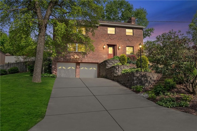 3 Patricia St, Fallowfield, PA 15022 - view of front facade featuring a garage, brick siding, driveway, and a chimney