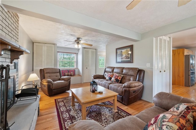 3 Patricia St, Fallowfield, PA 15022 - living room with a ceiling fan, a textured ceiling, light wood finished floors, and beam ceiling