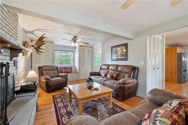 3 Patricia St, Fallowfield, PA 15022 - living room with a ceiling fan, a textured ceiling, light wood finished floors, and beamed ceiling