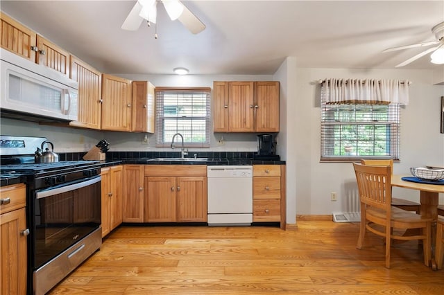 3 Patricia St, Fallowfield, PA 15022 - kitchen featuring white appliances, a sink, a ceiling fan, tile countertops, and light wood-style flooring