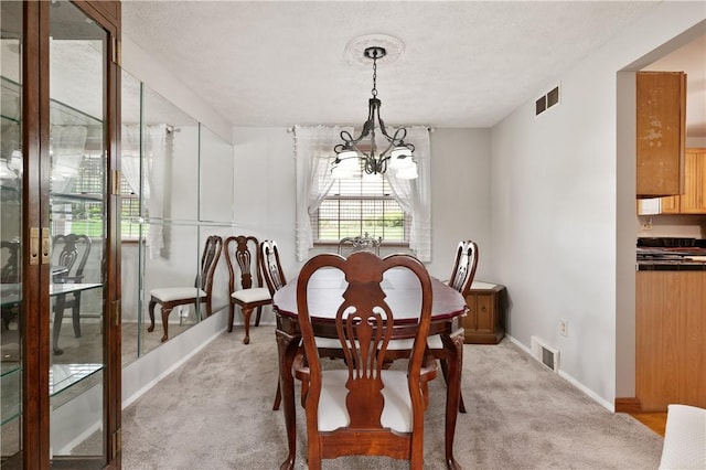 3 Patricia St, Fallowfield, PA 15022 - dining room with a chandelier, light carpet, and baseboards