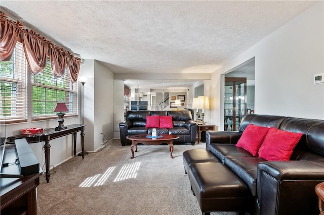 3 Patricia St, Fallowfield, PA 15022 - carpeted living room featuring a textured ceiling and baseboards