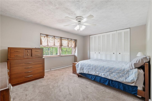 3 Patricia St, Fallowfield, PA 15022 - bedroom featuring a baseboard radiator, light colored carpet, baseboards, a textured ceiling, and ceiling fan