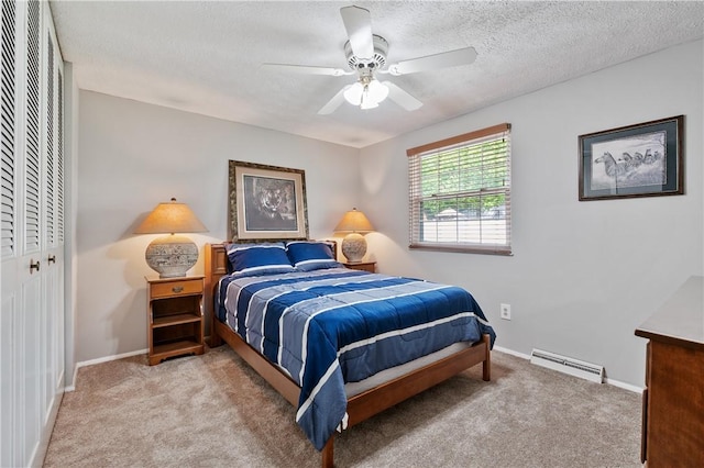 3 Patricia St, Fallowfield, PA 15022 - carpeted bedroom featuring baseboards, a textured ceiling, a baseboard heating unit, and ceiling fan